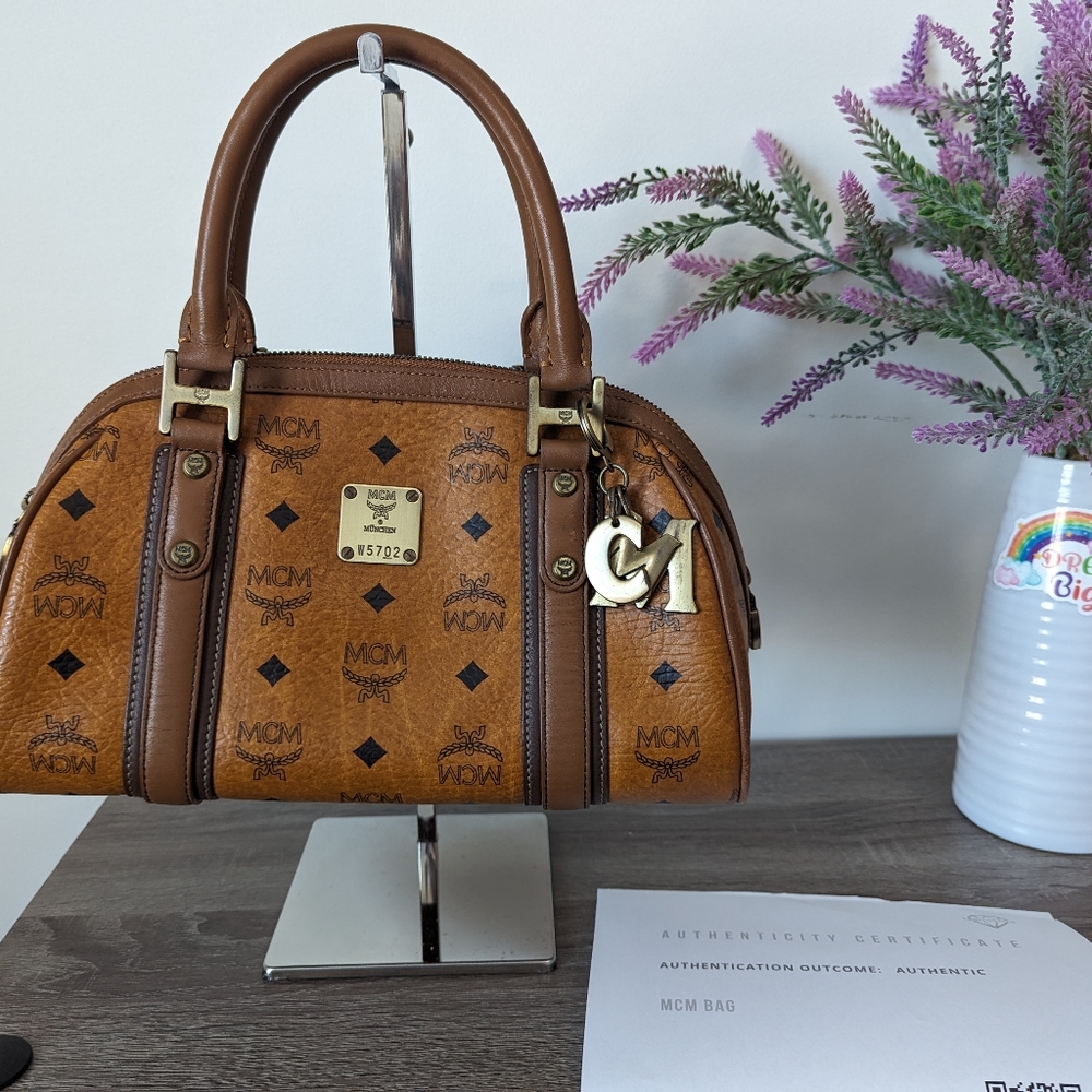 Authentic MCM cognac alma satchel